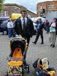 Tony Temple parades around town with the star prize provided by Nursery Rhymes.  (We tried, but he wouldn't fit in the buggy :-)