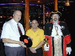 Just 5 hours and 15 minutes into the attempt, Danny takes time to pose with John Hicks (left) and Yeovil Town Crier (Bruce).

World Record Attempt - Chicago Rock, Yeovil, 23-Nov-2001